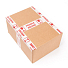 Krabice zalepená lepicí páskou FRAGILE/křehké