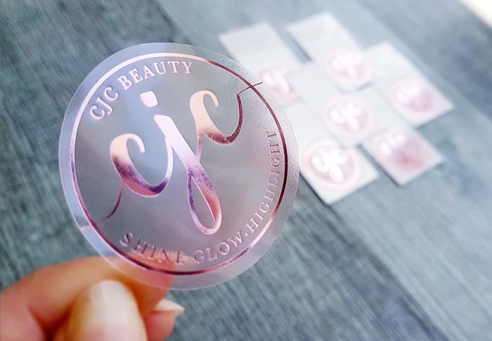 Priehľadná okrúhla samolepka s logom